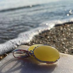 Cercei din argint și chihlimbar în formă ovală galbeni